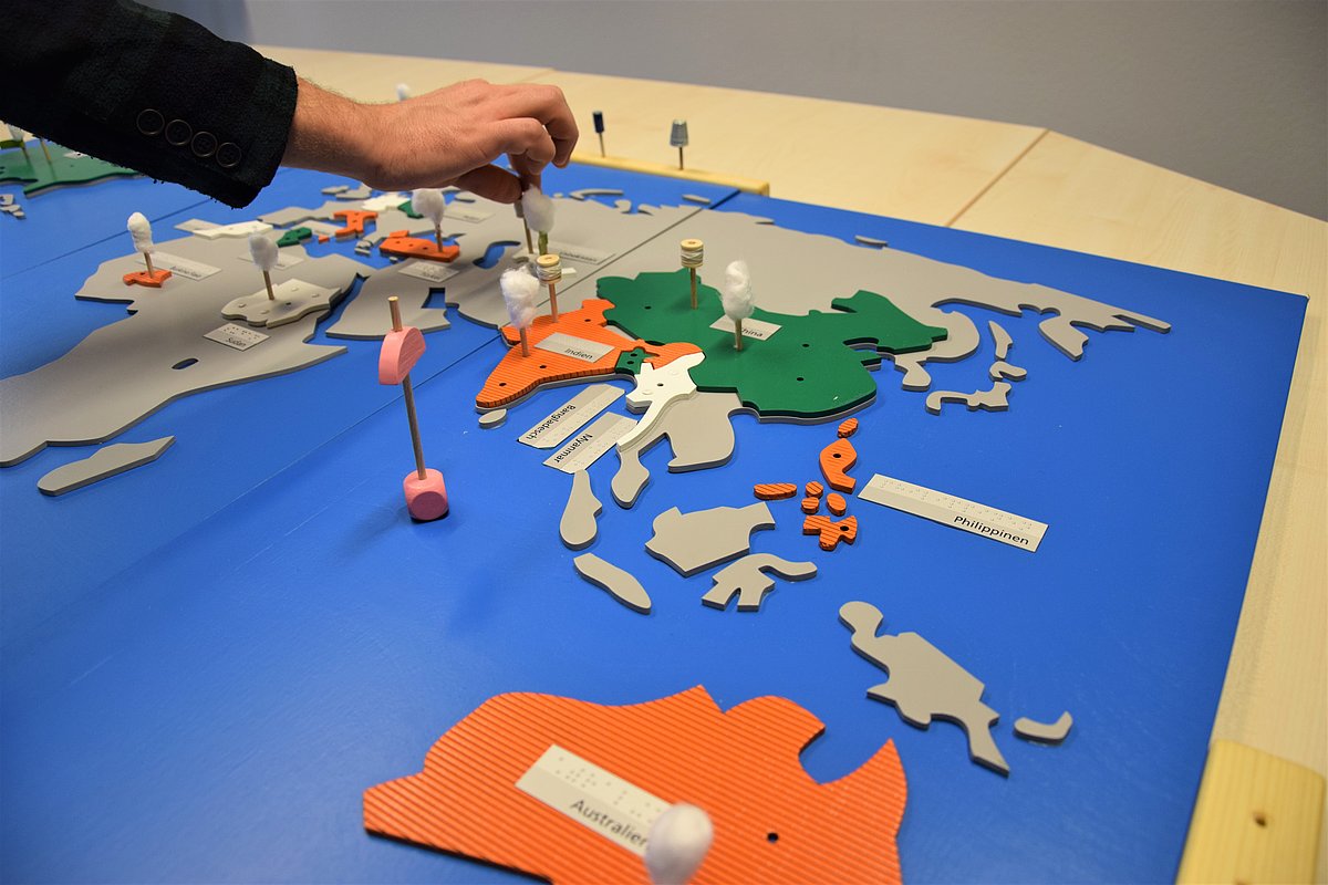 The picture shows a wooden game.